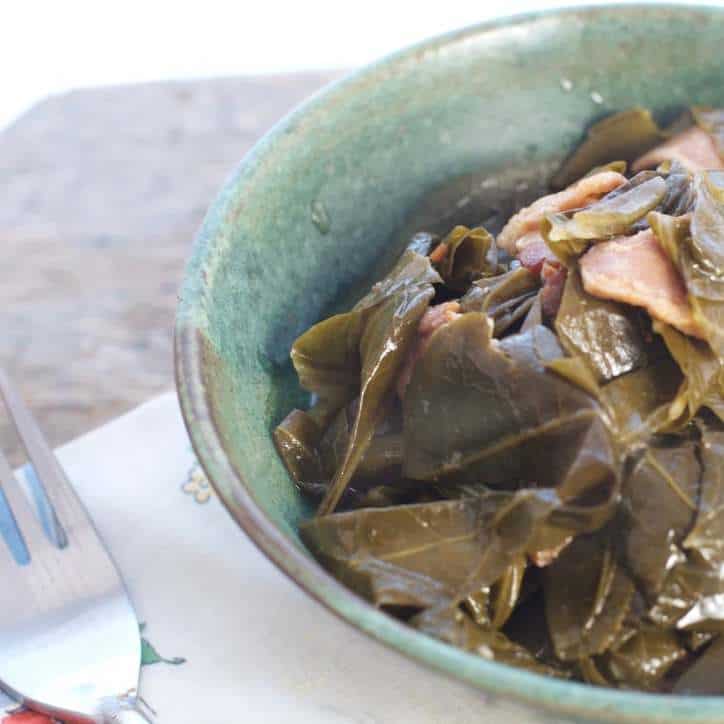 A close up view of greens THE SECRET TO PERFECT SOUTHERN COLLARD GREENS