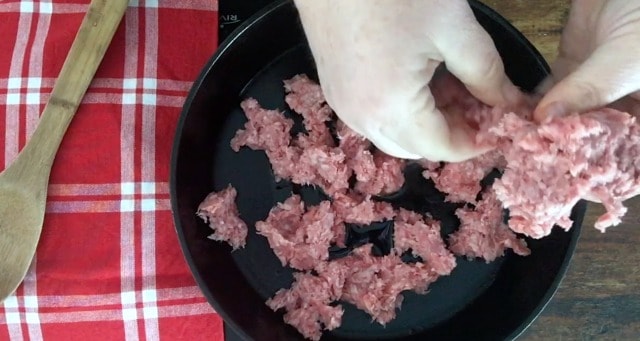 Use Your Potato Masher To Break Up Ground Meat in the Skillet