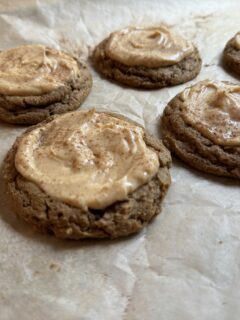 pumpkin cookies on parchment paper