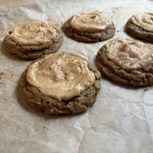 pumpkin cookies on parchment paper