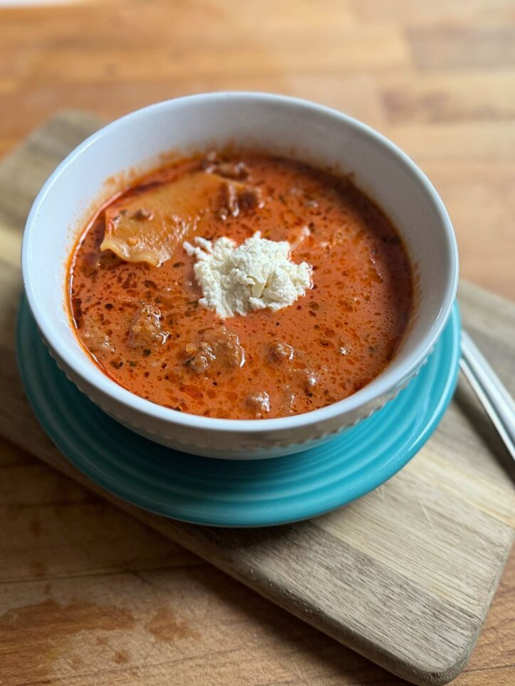 bowl of lasagna soup with a spoon