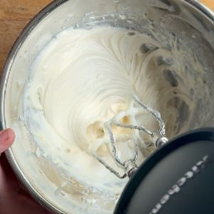 Mixing icing for pumpkin cranberry bread
