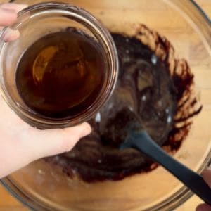 adding bourbon and vanilla extract to pecan pie