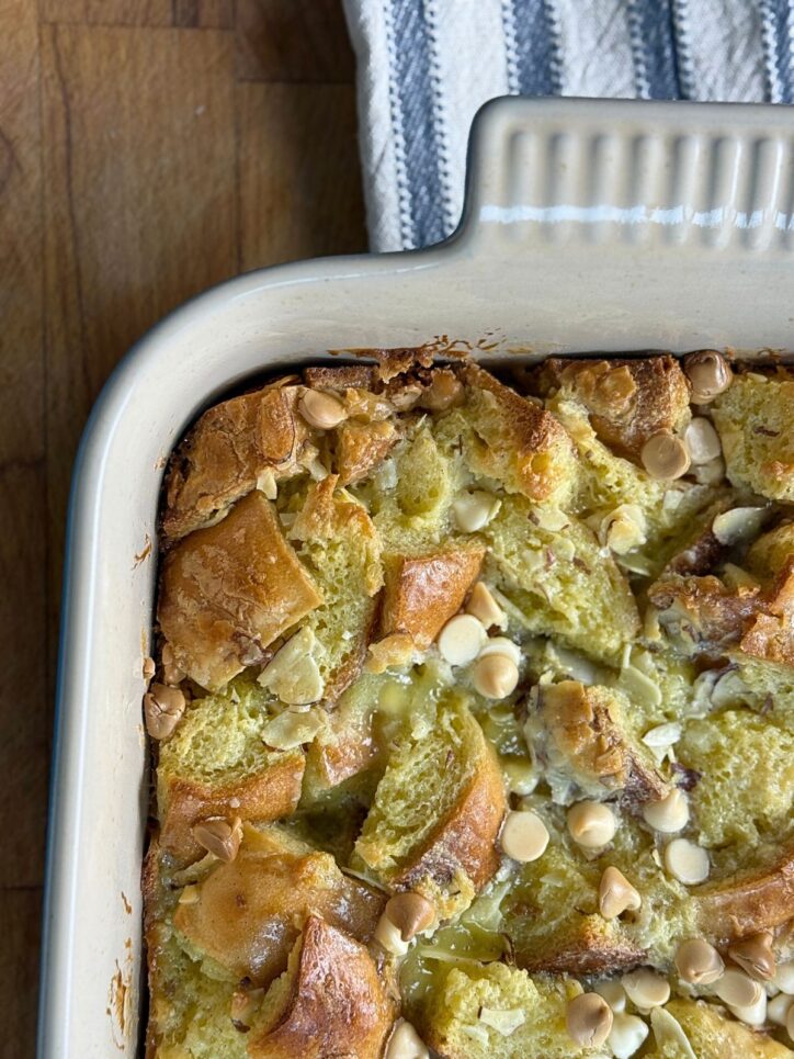 White Chocolate Almond Bread Pudding in a blue casserole dish