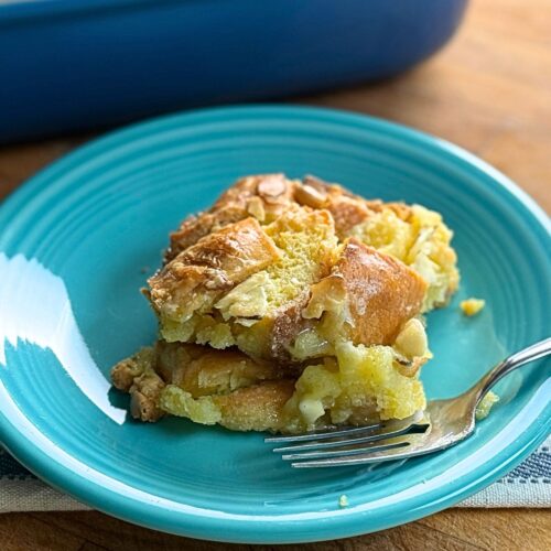 bread pudding on plate with a fork