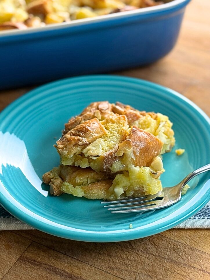 bread pudding on plate with a fork