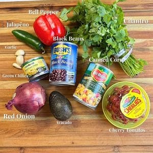 Ingredients for Cowboy Caviar on a cutting board