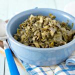 A close up photo from the side of HOW TO COOK CANNED COLLARD GREENS